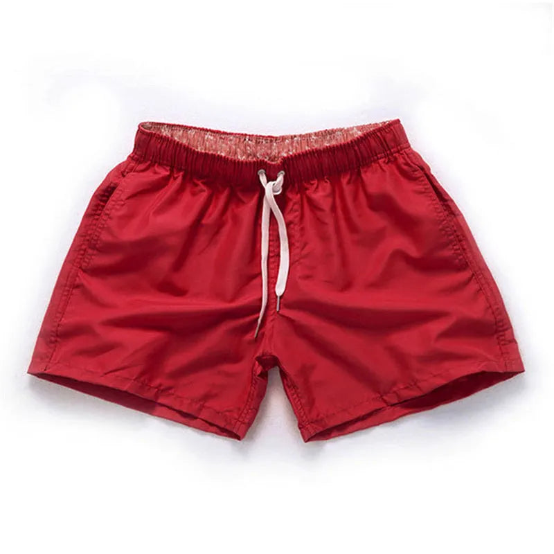 Men's straight leg beach shorts in polyester fabric for surfing and swimming