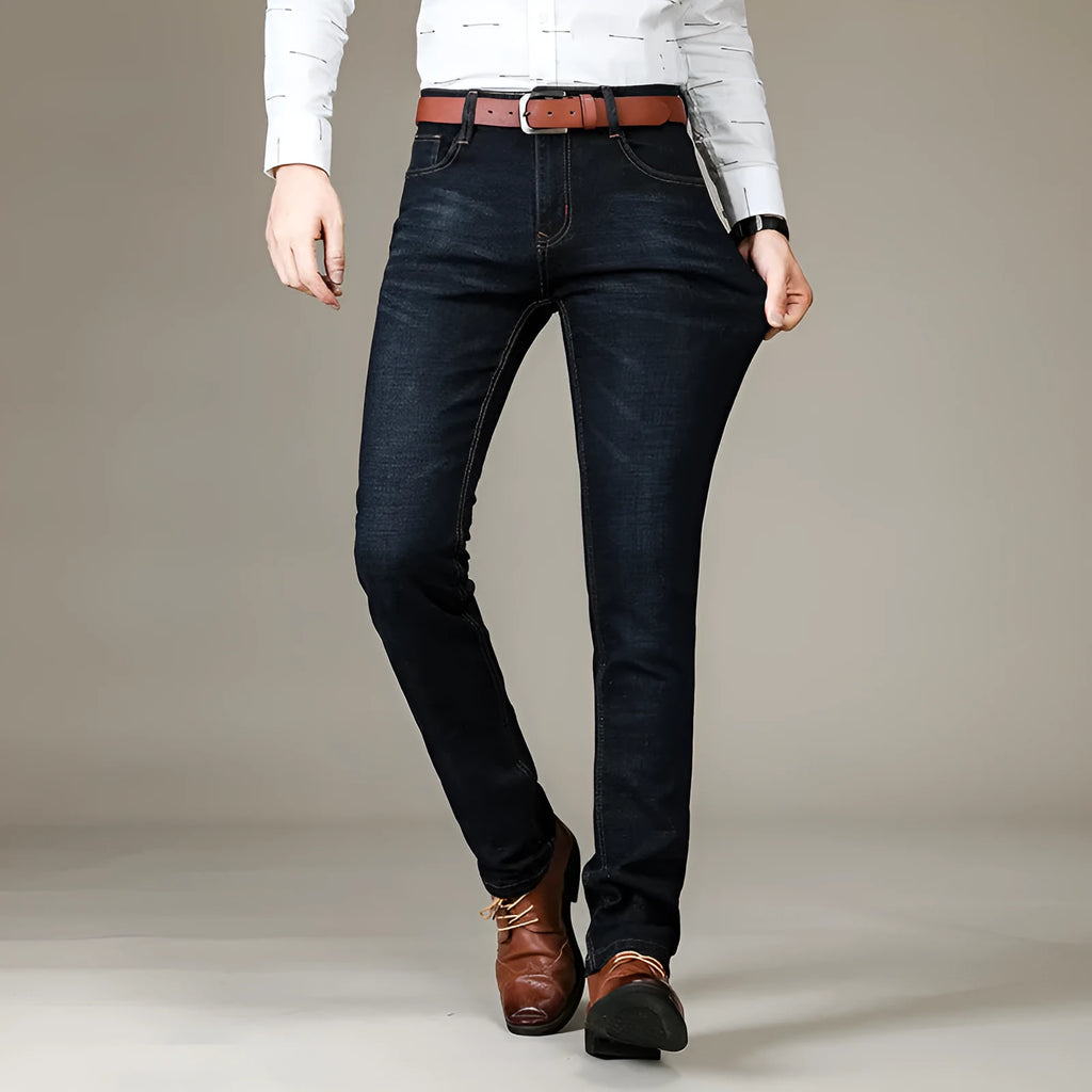 Men's slim fit elastic straight jeans in black cotton denim, full length view