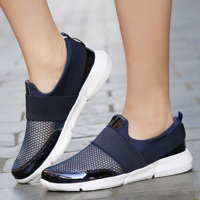 Women's low-top casual sneakers in blue with mesh detail and a PU midsole.