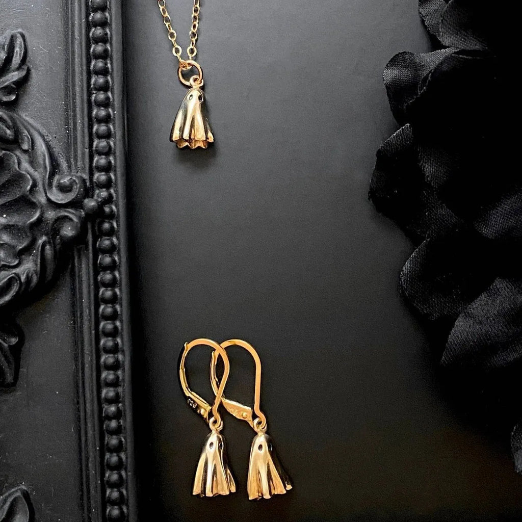 Ghost pendant necklace on twisted stainless steel chain with titanium steel detail