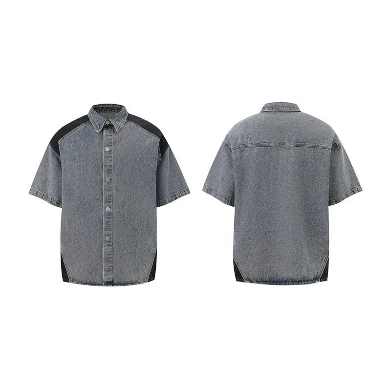 Retro washed blue denim short-sleeve jacket and trouser suit set laid flat.