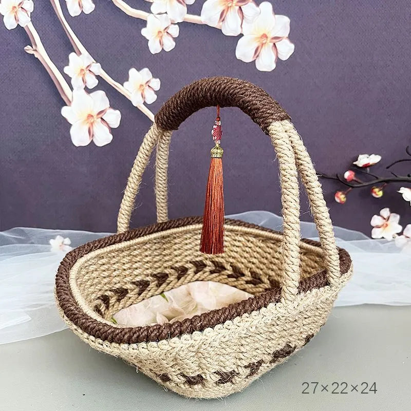 Coffee brown hand-woven straw basket with hemp rope detailing.