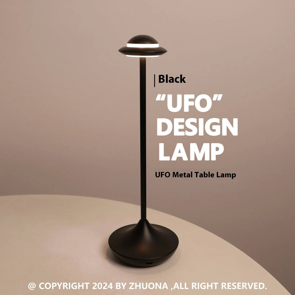 UFO-shaped metal table lamp with touch dimming control in gold, grey or black finish
