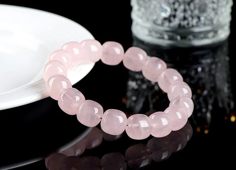 Pink crystal and natural bamboo bracelet with 11x12mm barrel-shaped geometry beads