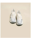 Women's grey and pink retro sneakers with low-top design and rubber sole