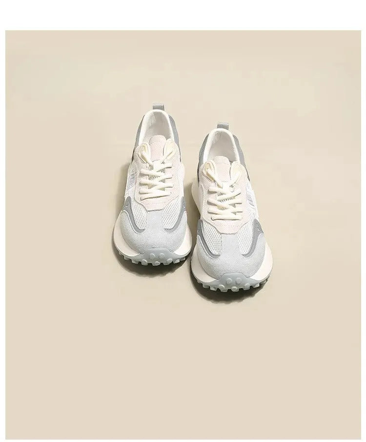 Women's grey and pink retro sneakers with low-top design and rubber sole