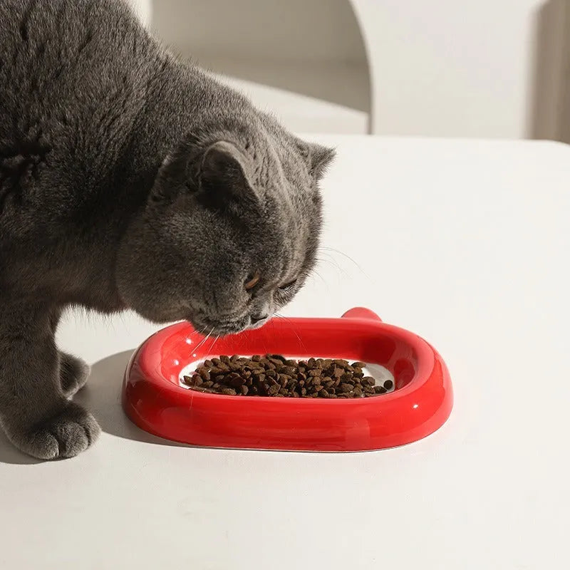 Ceramic pet bowl shaped like a cat, frog, panda, or pig for dry food or water.