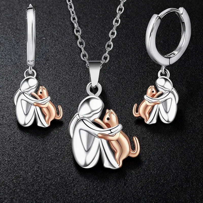 Little girl and dog hugging alloy earring set with O-ring chain necklace in colour option