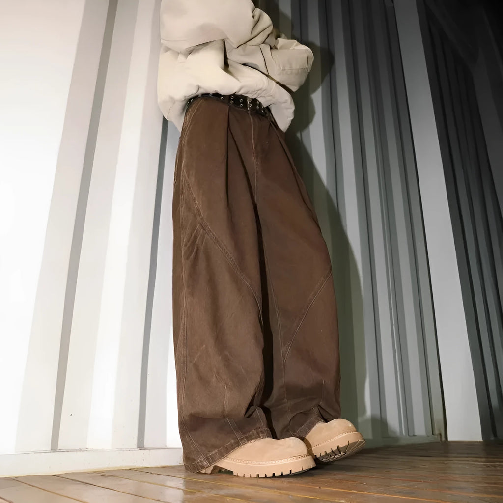Men's pleated straight leg trousers in stripe patterns showing loose fit and micro elastic fabric