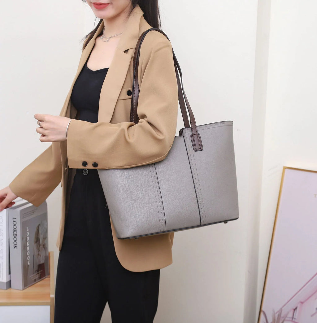 Women's genuine leather shoulder bag in box-type shape, shown in a choice of colours including khaki and black.