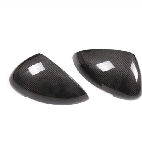 Pair of black true carbon fibre rearview mirror covers for Porsche Macan SUV.
