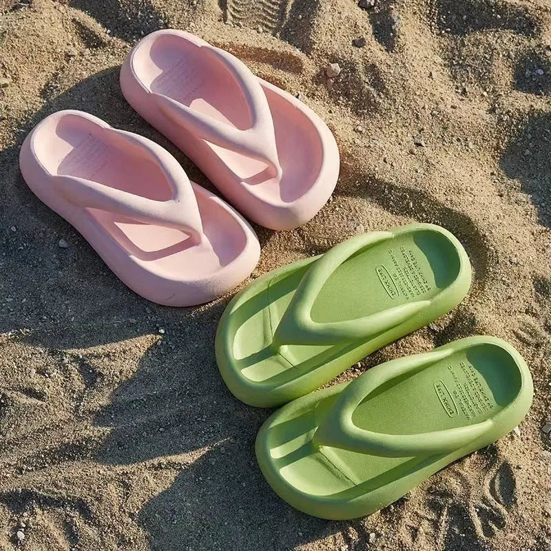 Solid colour women's flip-flops with a thick EVA sole and a small bow on the upper.