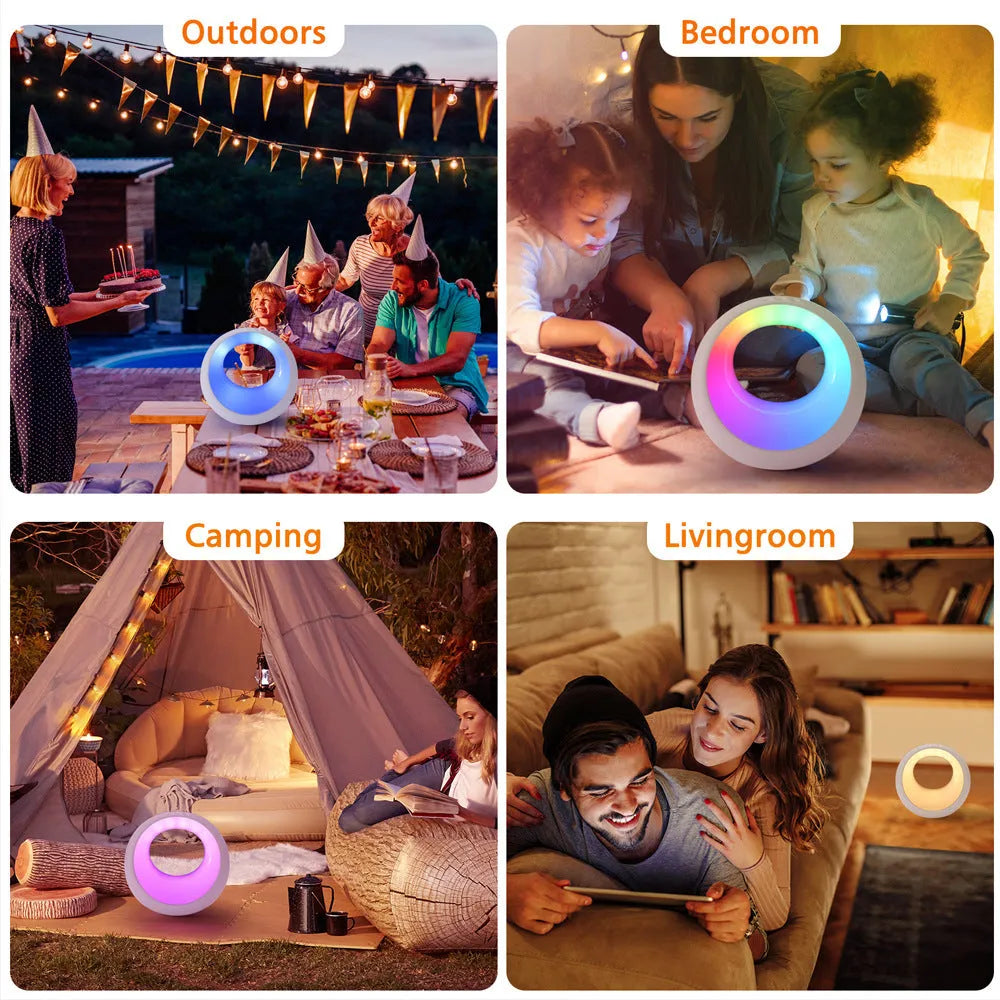 Small white RGB colour changing desk lamp with remote control on wooden surface
