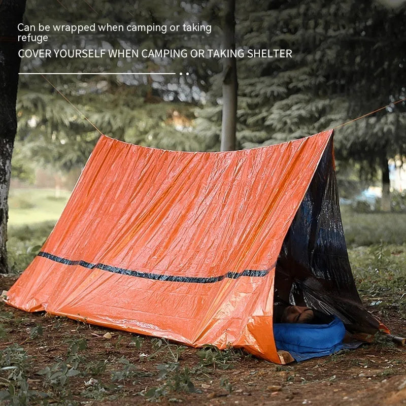 Orange and green emergency disaster relief tent with sleeping bag and raincoat set