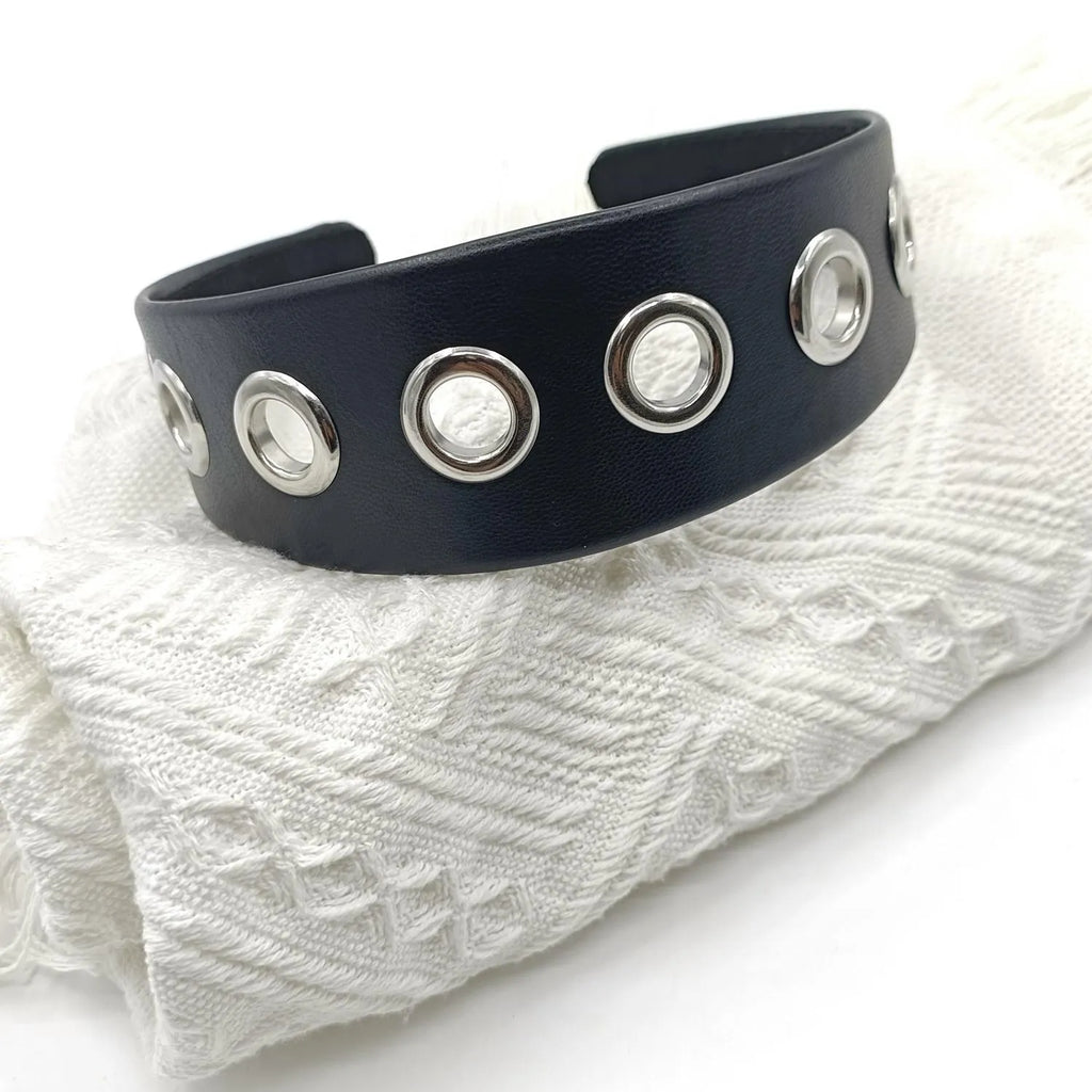 Black artificial leather wide headband with round, square, and dotted rivets for women punk style