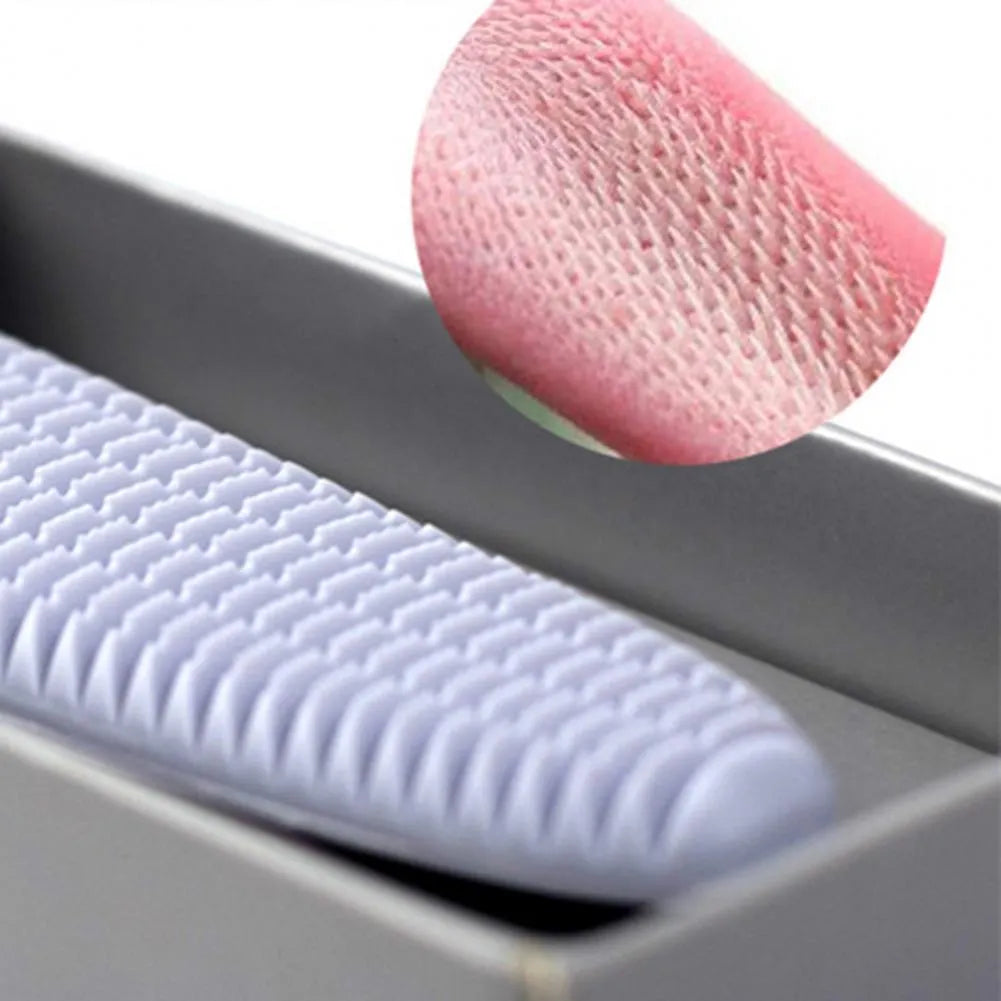 Grey cat grooming comb with tongue massager design showing narrow and wide ends