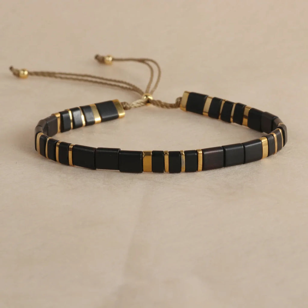 Geometric pull bead glass bracelet in multiple colour options on wrist