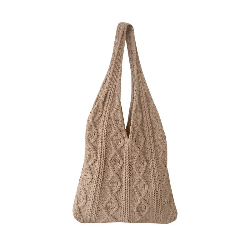 Retro hollow-knitted shoulder tote bag in solid colour with double straps showing textured yarn construction