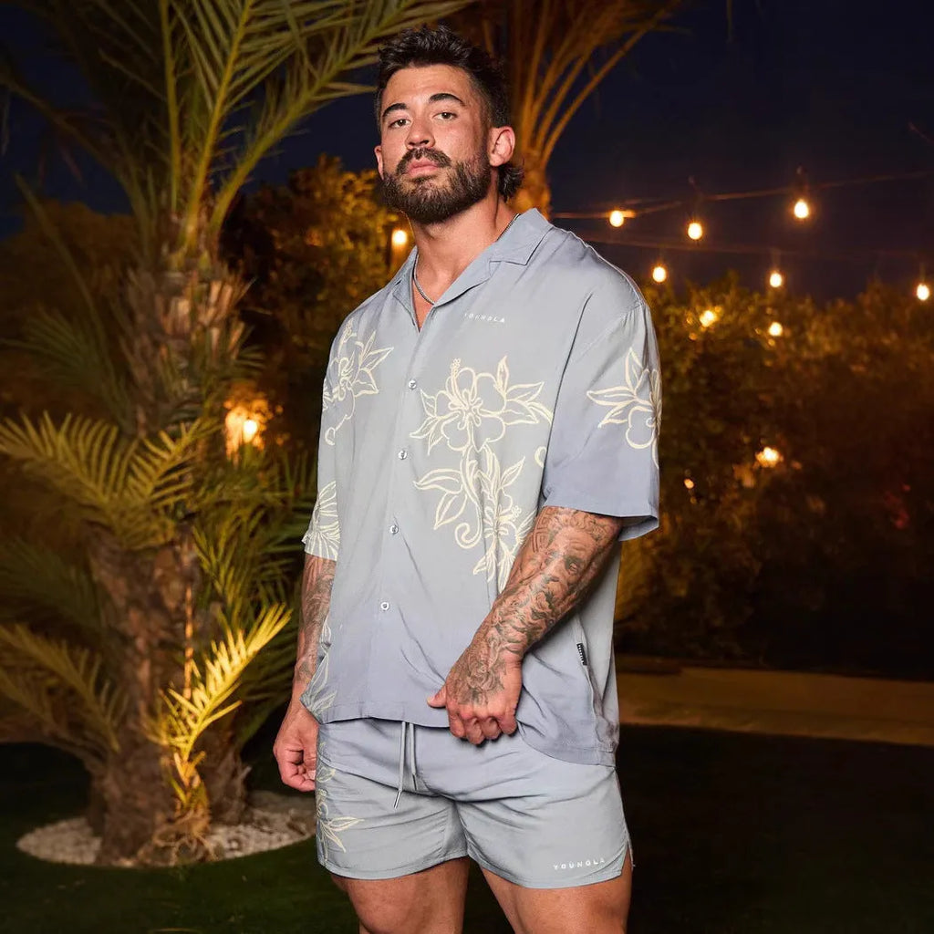 Men's loose-fitting floral printed cardigan-style top with short sleeves in light colour
