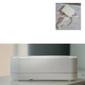 Black Flame Air ultrasonic humidifier diffuser emitting cool mist with a multi-colour LED flame light effect at its base.