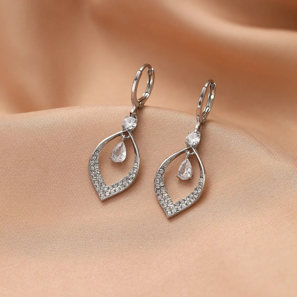 Women's copper water drop tassel earrings with zircon accents and thickened gold ear buckles