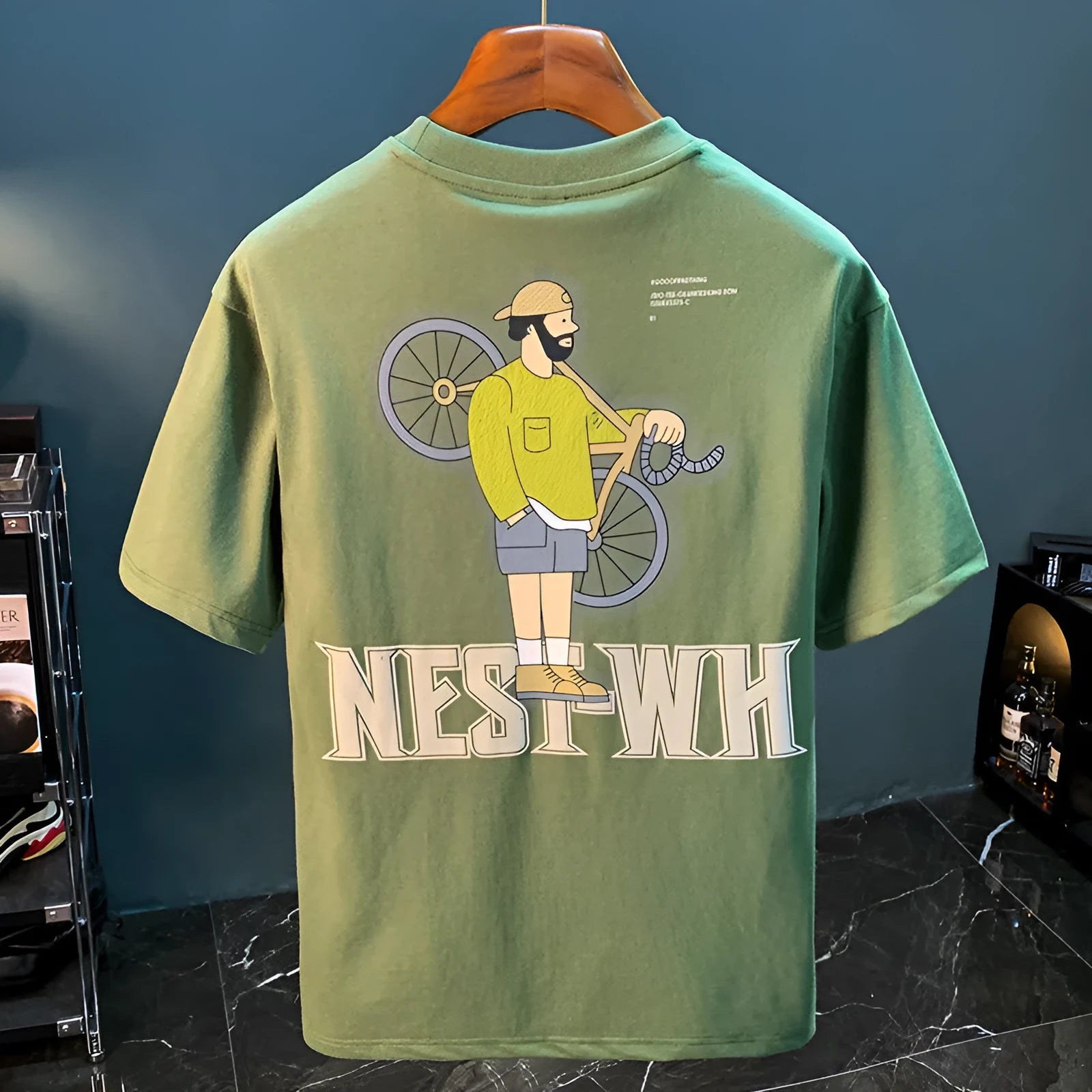Green loose fit men's t-shirt with literary youth print design and short sleeves
