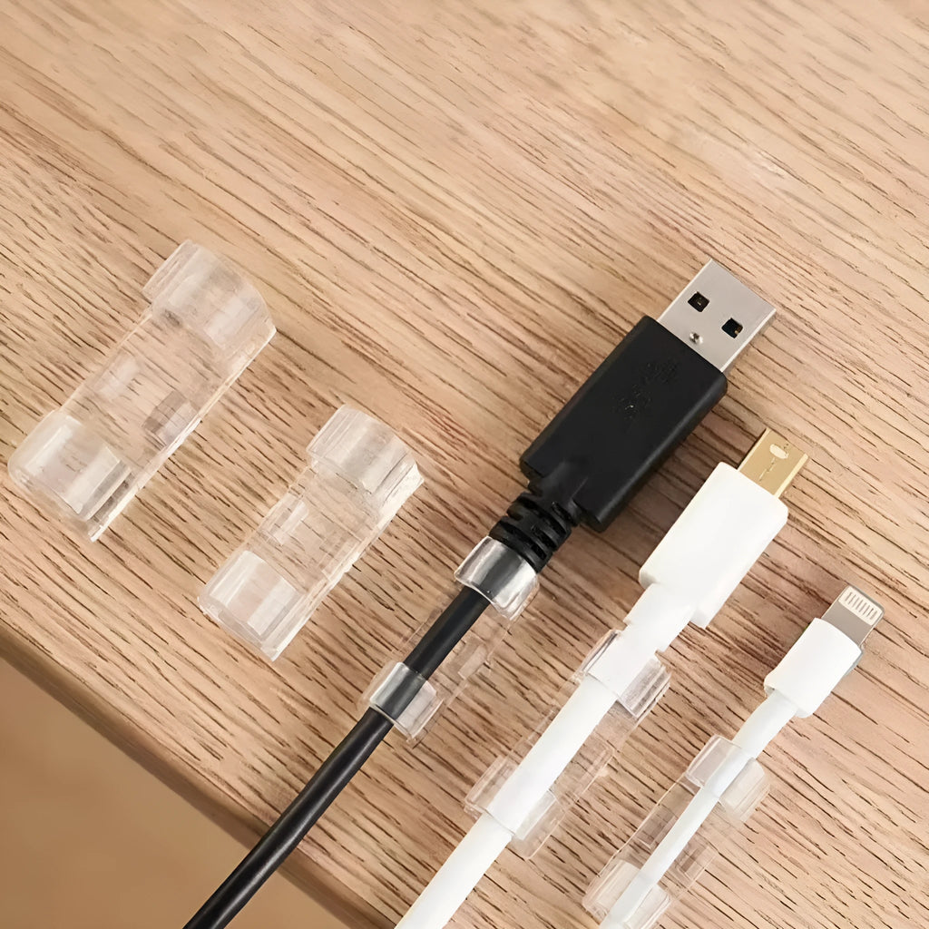 Transparent plastic self-adhesive cable routing clips in four sizes for wire organisation