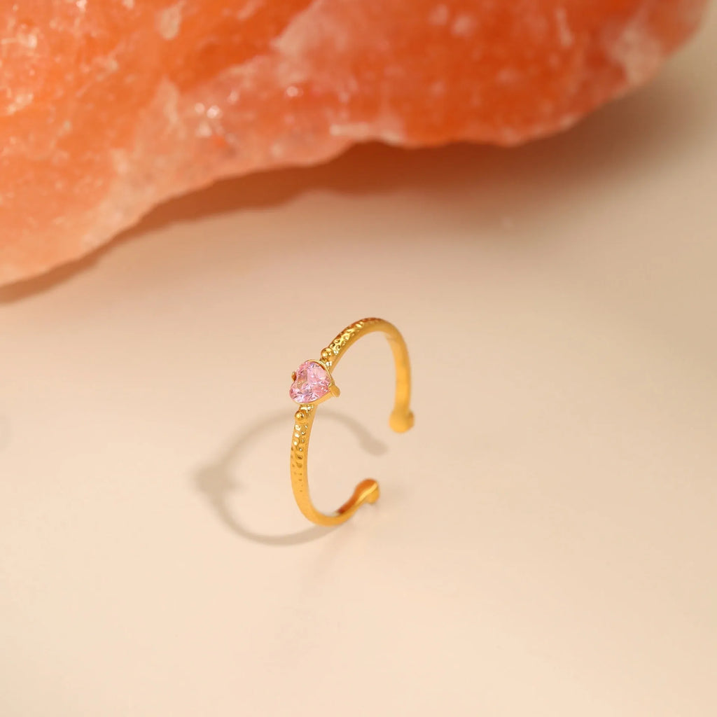 Open ended stainless steel heart ring with geometric design and inlaid zircon stones