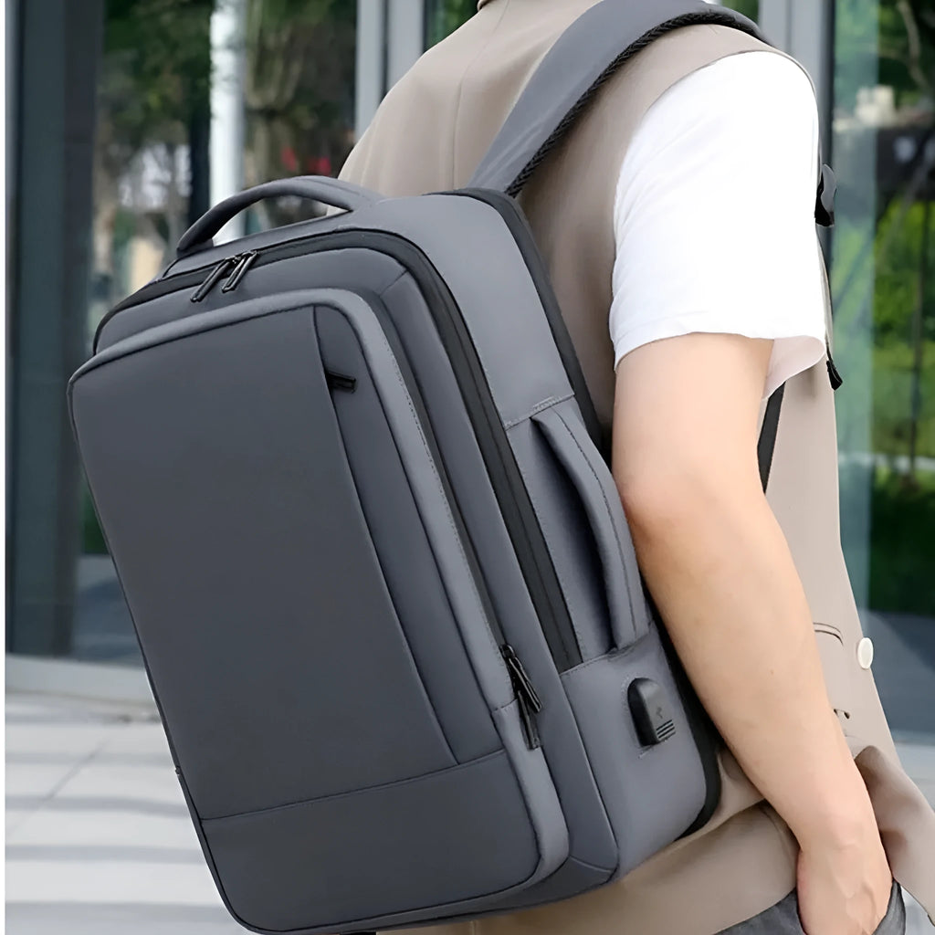 Men's waterproof Oxford cloth backpack with curved shoulder strap in black or grey