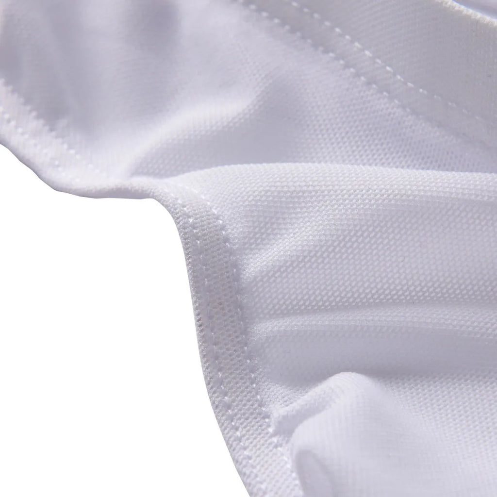 Men's black nylon fashion shorts with low waist and triangular cut on plain background