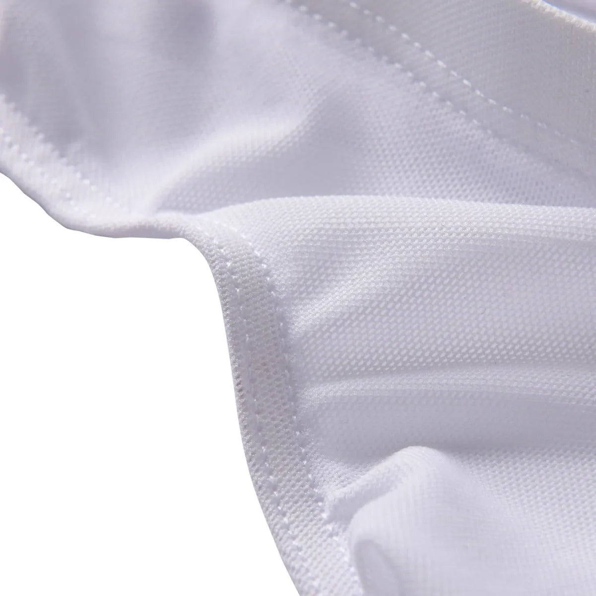 Men's black nylon fashion shorts with low waist and triangular cut on plain background