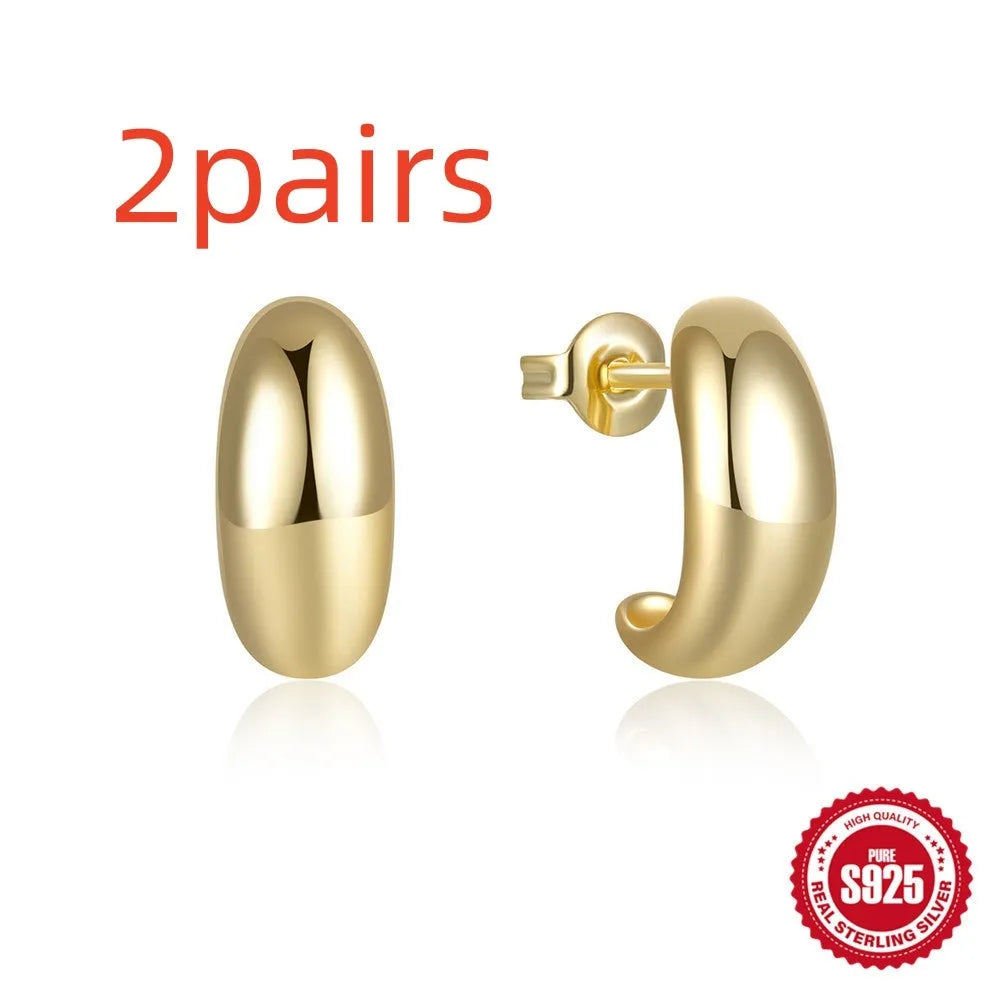 Sterling silver C-shaped stud earrings with electroplated gold finish geometric jewellery