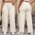 Women's high-waisted wide-leg straight jeans in apricot colour on a hanger