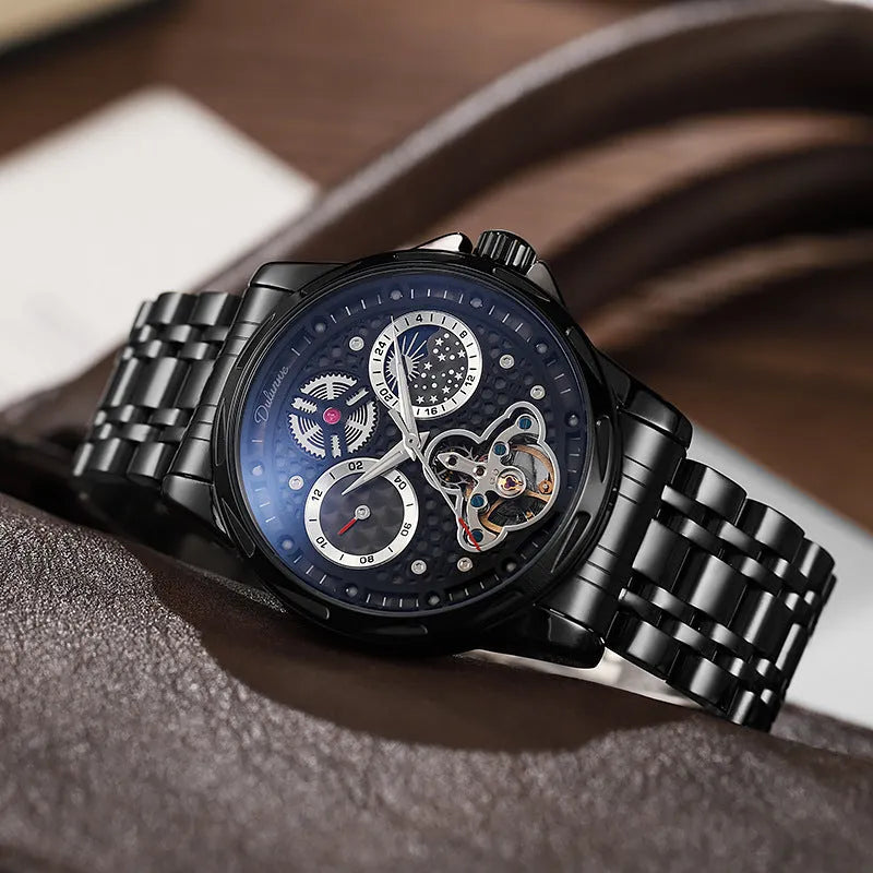 Men's automatic waterproof watch with luminous hands on a steel bracelet, showing a black dial in a 13mm thick case.
