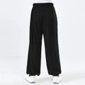 Children's black high-elasticity Sanda practice pants made from lycra and spandex fabric.