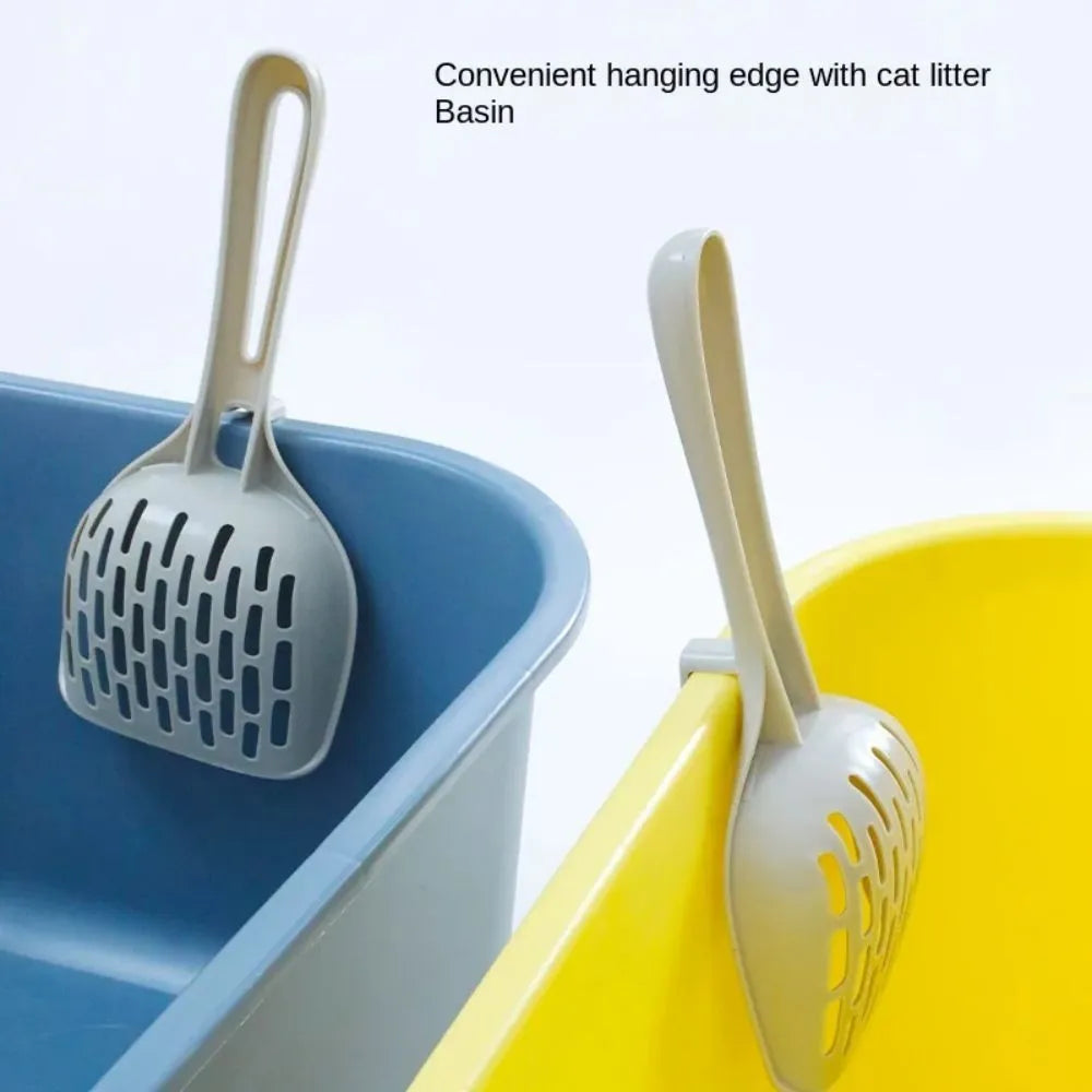 Grey plastic cat litter scoop with matching base tray for self-cleaning litter boxes