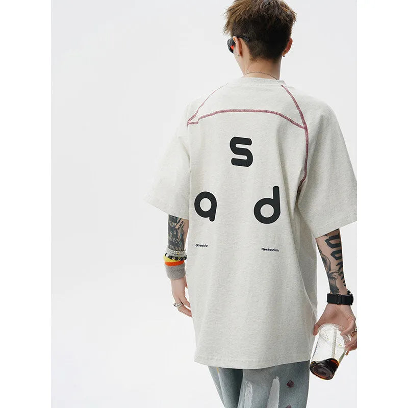 Cotton loose fit short-sleeve T-shirt with letter print on front, shown in black colour