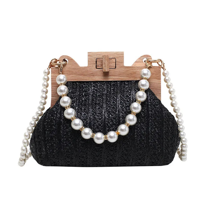 Women's straw woven shoulder bag with pearl chain strap in horizontal square shape