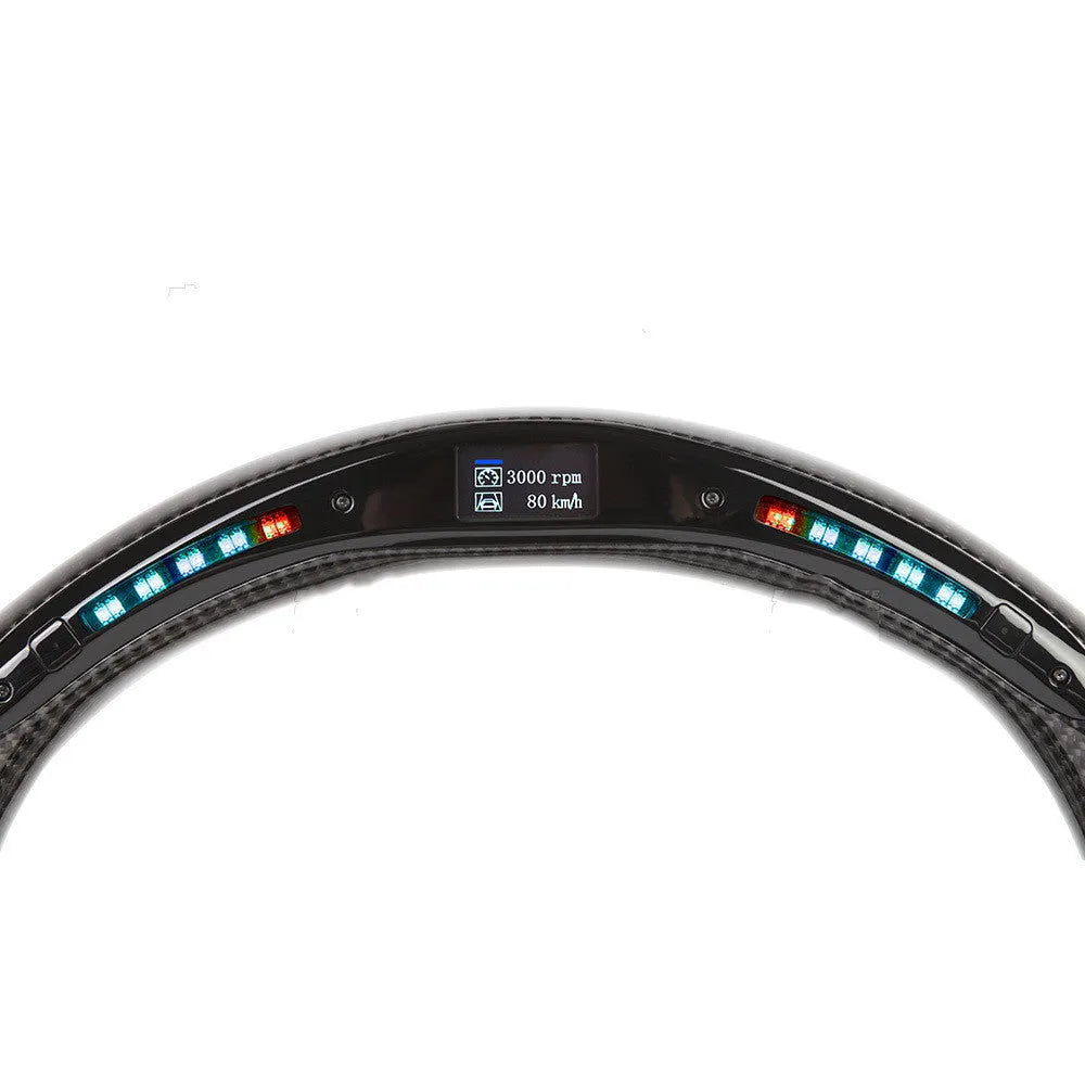 Black carbon fibre sports steering wheel with LED display for BMW X3 and X5 cars.
