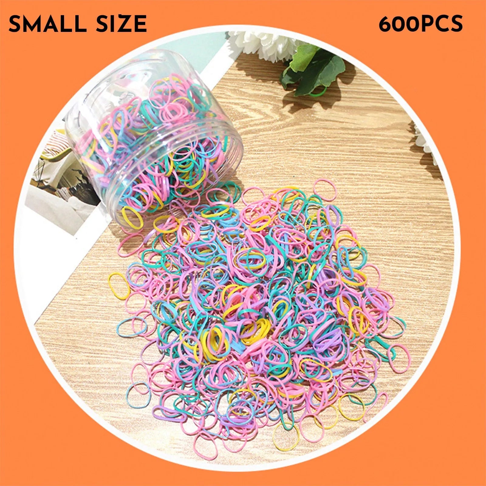 Pack of multicolour TPU baby hair ties for toddlers in a clear reusable container.