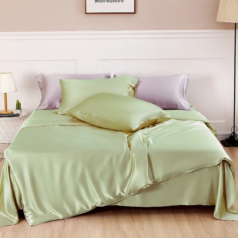 Double-sided silk duvet cover in six solid colours showing smooth plain weave texture