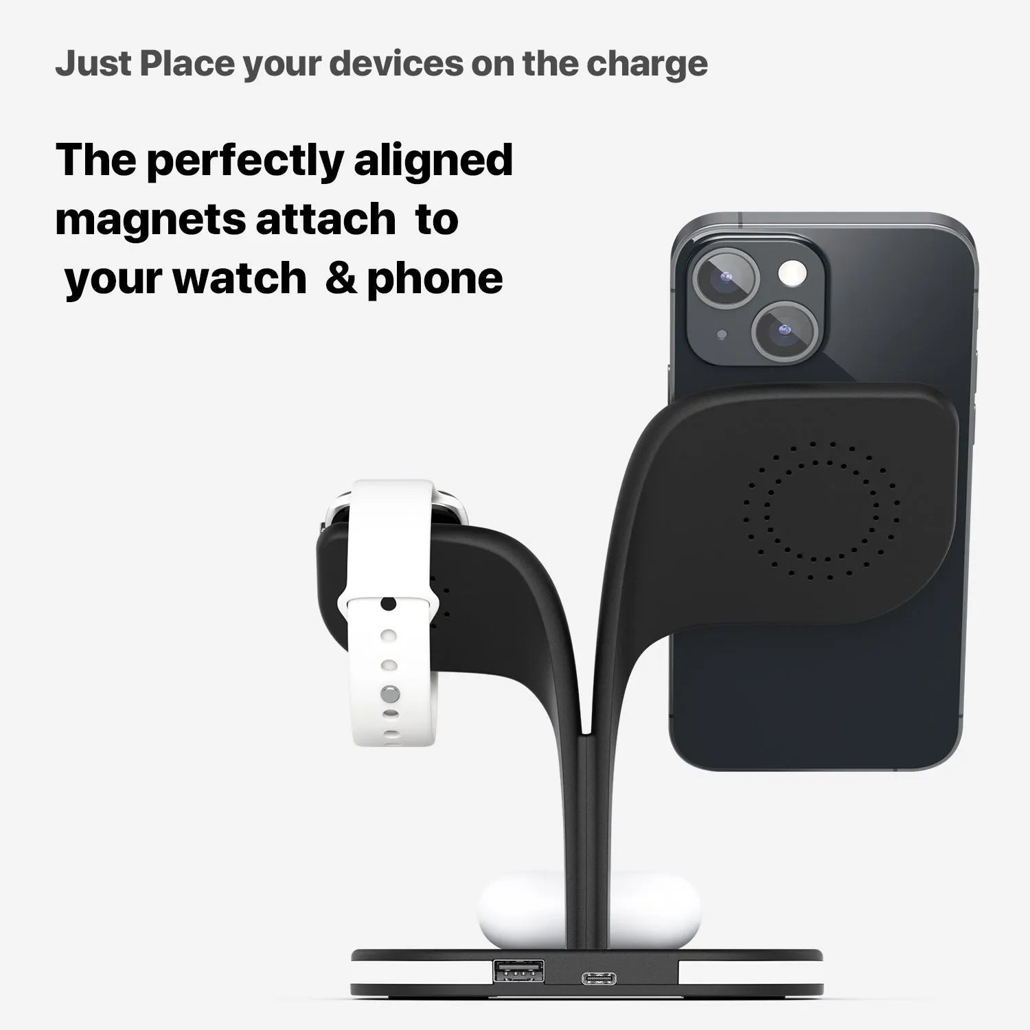 Black wireless charging stand for phone, watch, and headphones on desk with USB cable