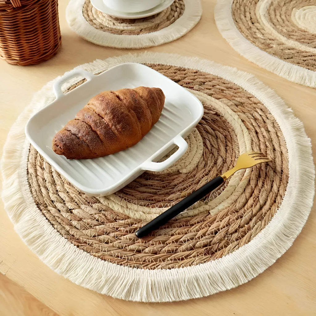 Round straw placemat with tassel edges in papyrus material showing corn rope colour option