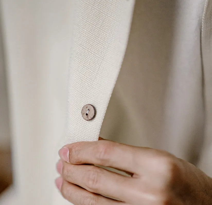 Light apricot men's Cuban collar shirt with an all-over bamboo and floral plant pattern print.