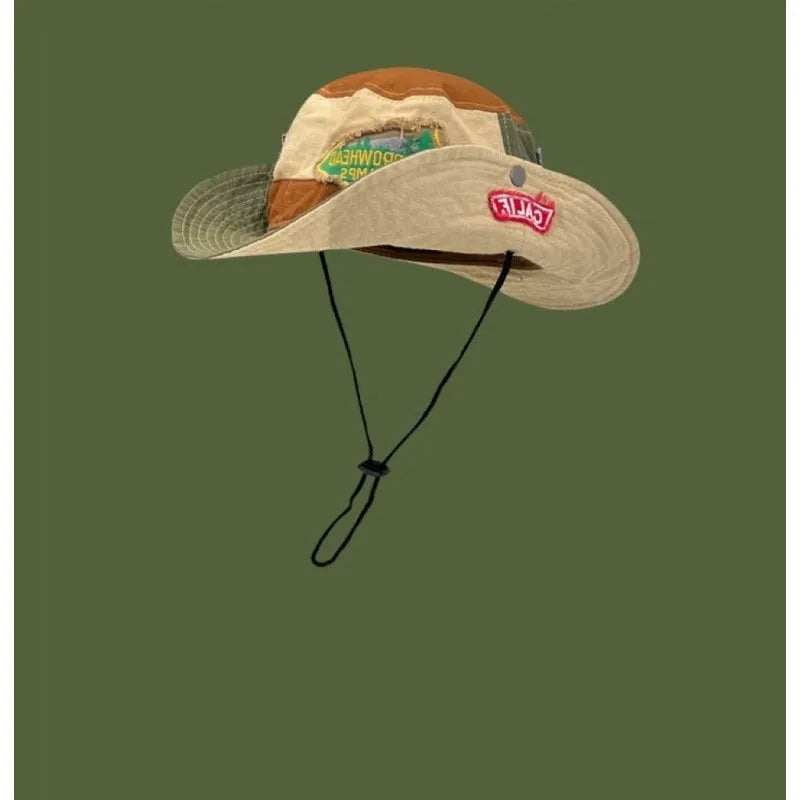 Army green women's foldable cotton fisherman hat with retro patchwork design and flat crown.