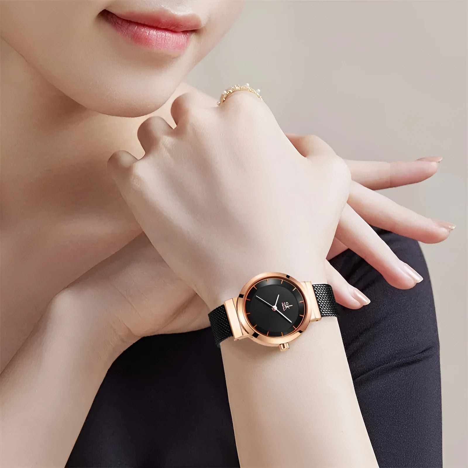 Stainless steel women's watch with round dial, 30mm thickness, and mineral glass mirror on a white background