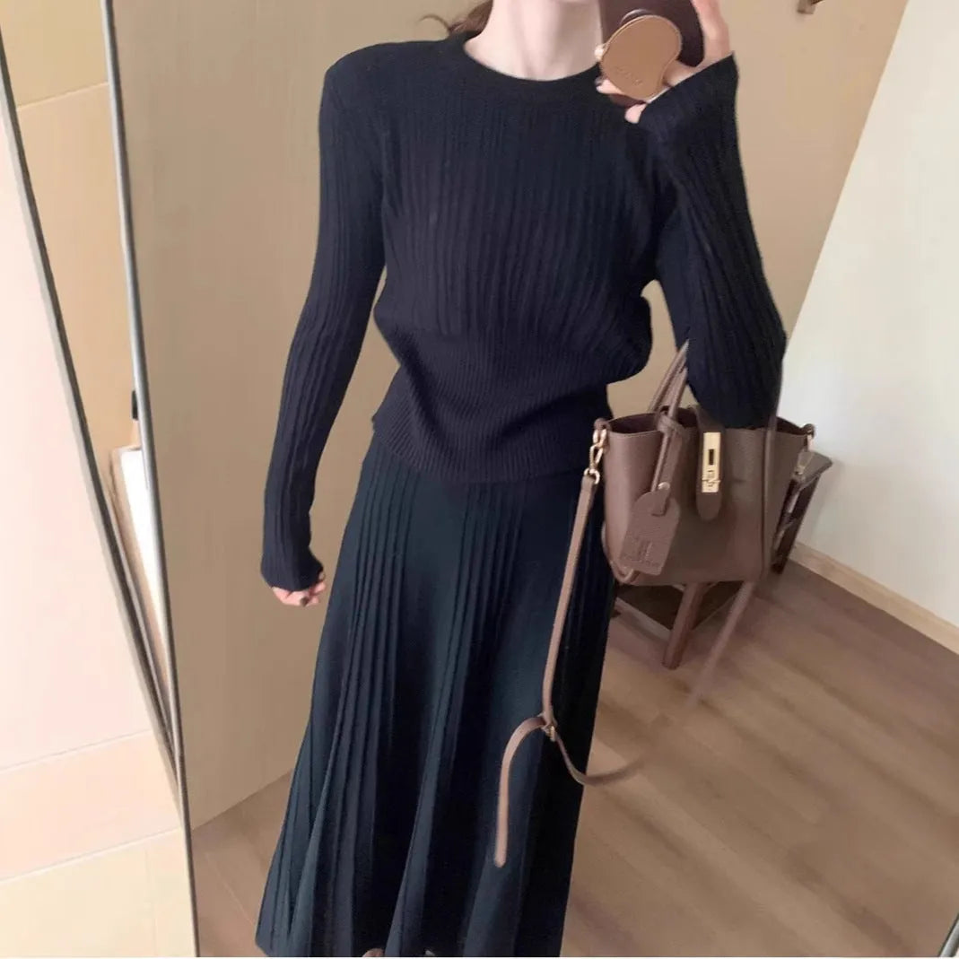Dark grey knitted long dress suit with 3D texture, featuring a sweater and skirt in artistic retro style.