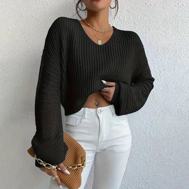 Solid colour long sleeve women's pullover in a loose casual fit, shown in one of five colour options.