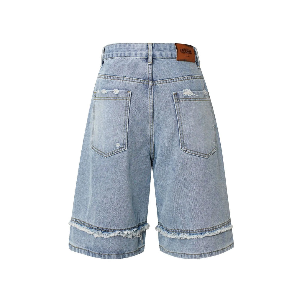 Men's distressed raw edge denim shorts in straight leg cut with cropped length