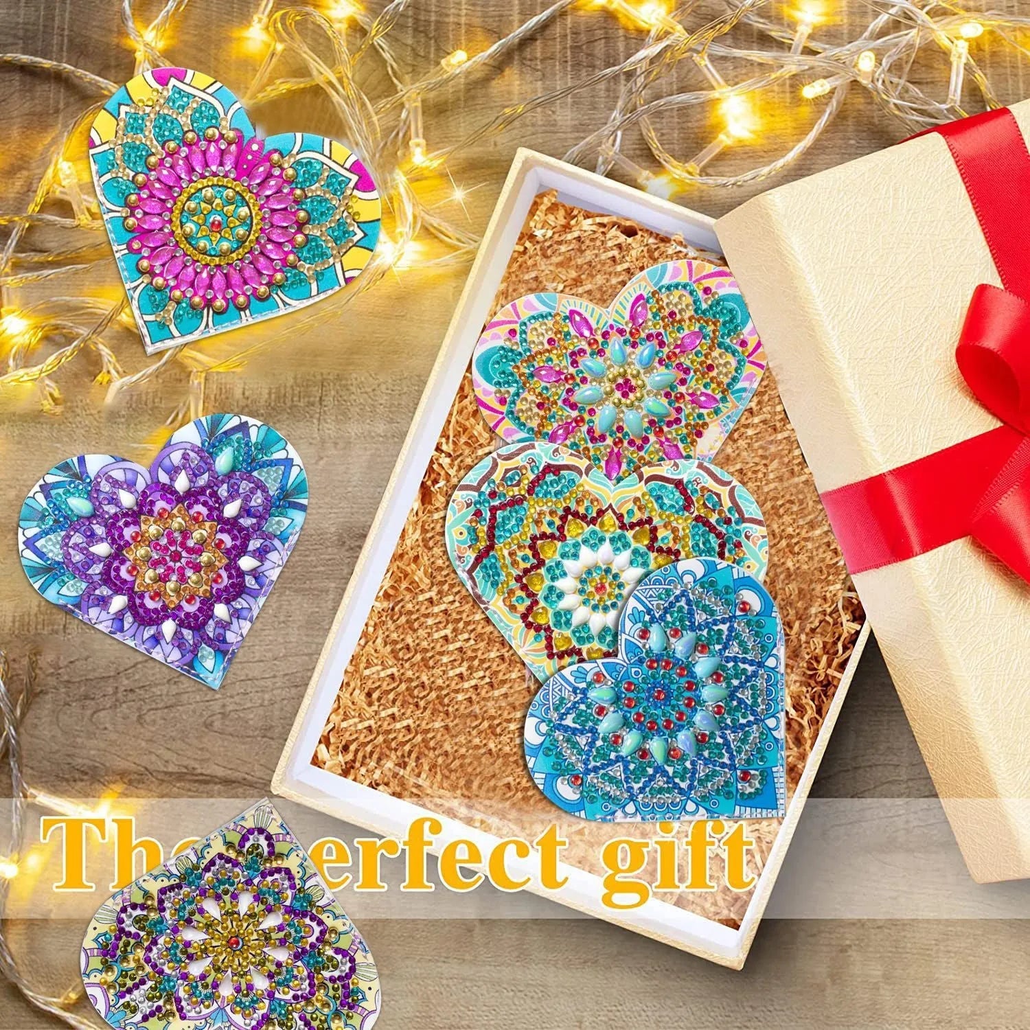 Six handmade PU leather bookmarks with crystal and floral corner designs on a book.